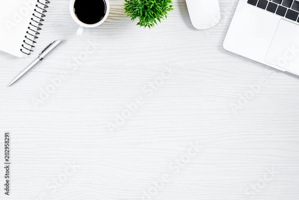 Fototapeta White wood office desk table and equipment for working with black coffee  in top view and flat ray concept.