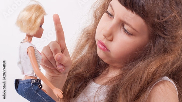 Obraz Little girl playing with doll
