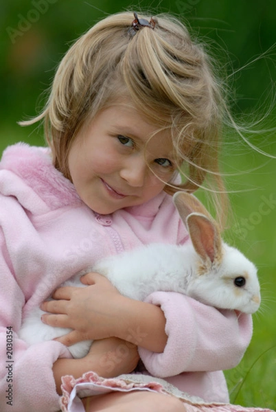 Obraz little girl with a rabbit
