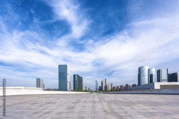 Fototapeta empty marble floor with city skyline