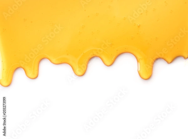 Obraz Kapiący miód na białym tle