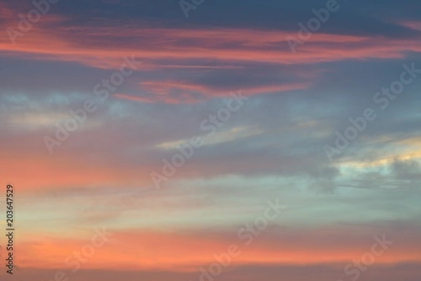 Fototapeta Nature background of vibrant colorful sunset clouds