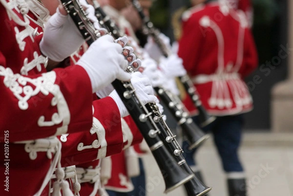 Obraz National Guards men brass band with official uniforms at a big parade to celebrate the holiday in Sofia, Bulgaria