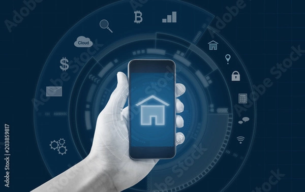Fototapeta Smart home and buildings mobile application. Hand holding mobile smart phone 
