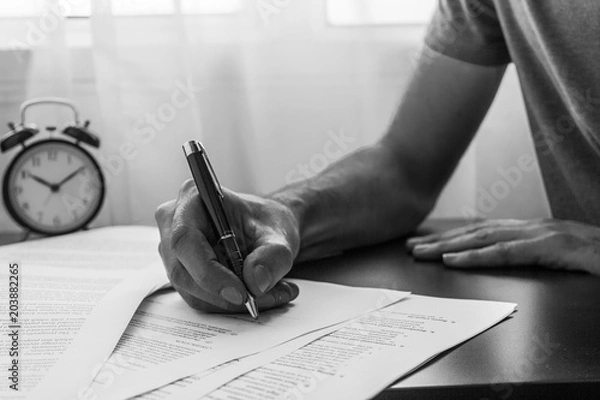 Fototapeta Filing taxes manually with paperwork for 2019 and 2019 tax years after reform.