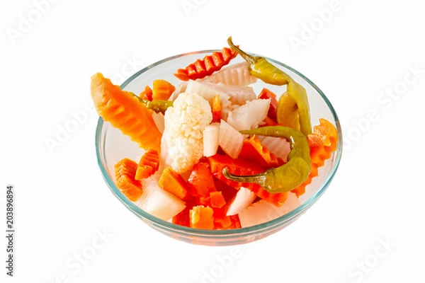 Obraz Assorted pickles vegetables carrot, chilli, cauliflower in glass bowl. Top view. Isolated. Copy space.