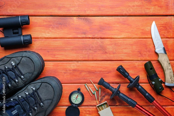 Obraz Flat lay image of  plan travel.Background concept.Items for traveler and backpacker adult or teenage to holidays trip.Items for hiking and travel to mountains.Space for creative design.