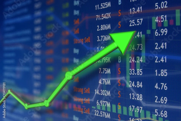 Obraz Investing and stock market concept gain and profits with faded candlestick charts.