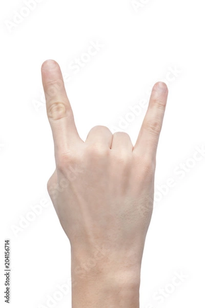Fototapeta Hand formed in a goat sign on white background. Showing rock-n-roll sign isolated.