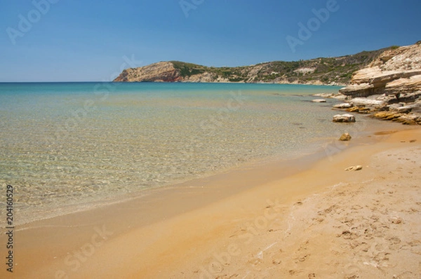 Fototapeta Crystal clear waters of Provatas beach at Milos island in Greece