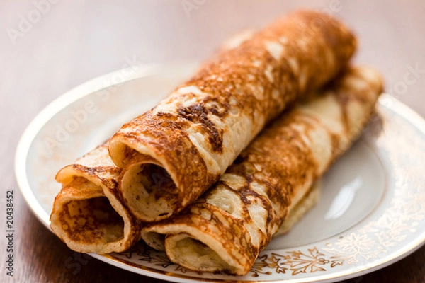 Fototapeta Rolled pancakes