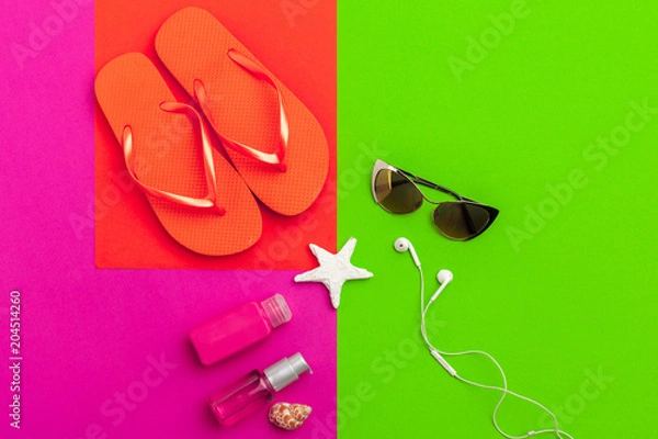 Fototapeta Summer holiday background, Beach accessories on color block background