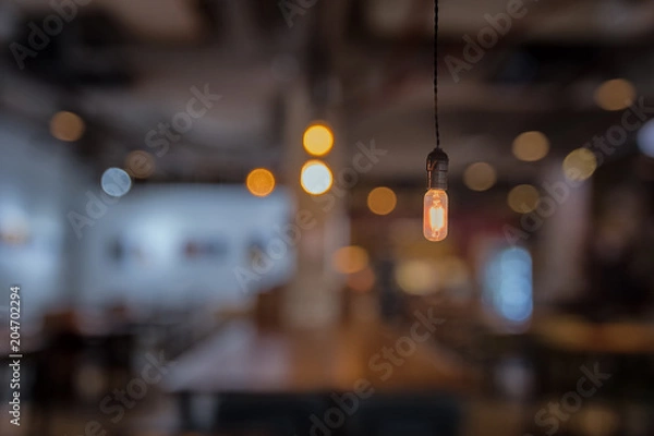 Obraz Vintage light bulb in cafe