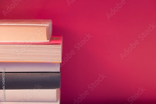 Obraz Stack of colorful books and free copy space