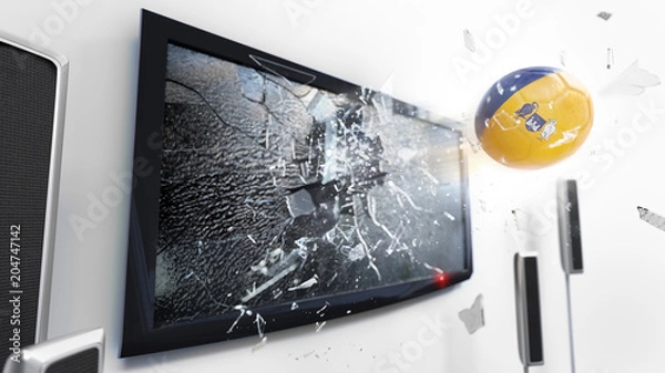 Obraz Soccer ball with the flag of Australian Capital Territory kicked through a shattering tv screen.(3D rendering series)