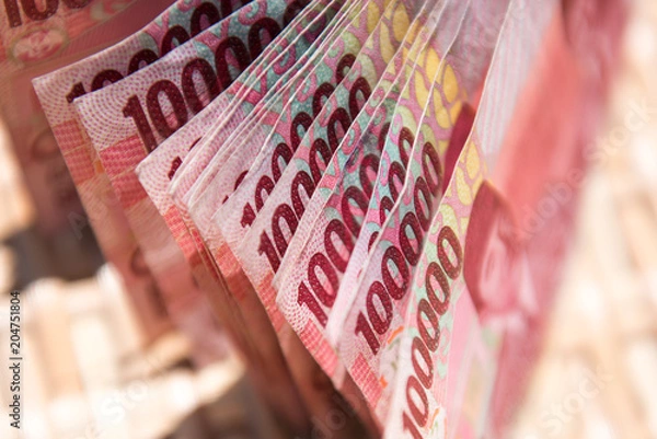 Obraz Close up of Indonesian money, 100,000 IDR banknotes