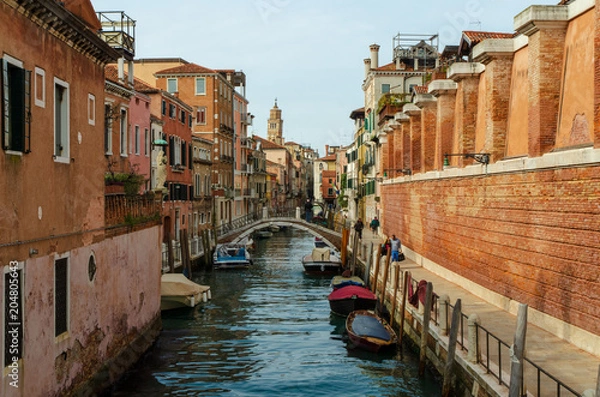Obraz View of a canal Rio de la Sensa in Venice with some boats and a sunny light, Italy