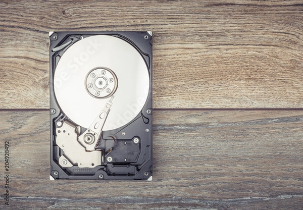 Obraz Disassembled Hard drive on the table