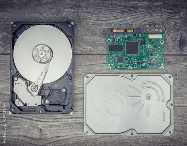 Obraz Disassembled Hard drive on the table