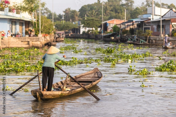 Obraz Boats are also being used as a taxi in Mekong Delta in Vietnam