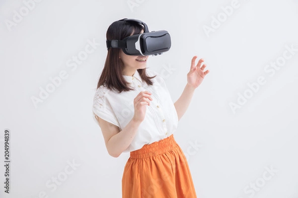 Fototapeta VRを体験する女の子