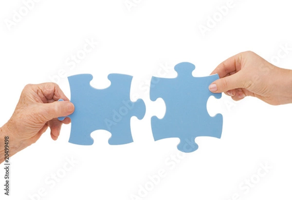 Fototapeta Hands and puzzle, isolated on white background