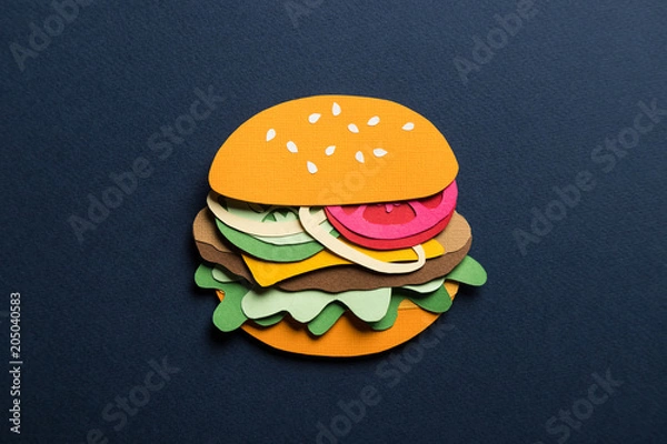 Fototapeta Creative art conceptual collage with space for text. Stylized craft paper burger a red background. Composition cut out from colored paper. Illustrative picture.