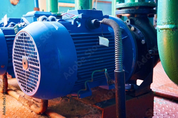 Obraz Blue electric motor with pump close-up. Abstract background.