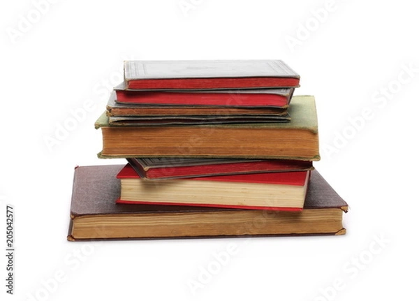Fototapeta Stack of old antique big books isolated on white background