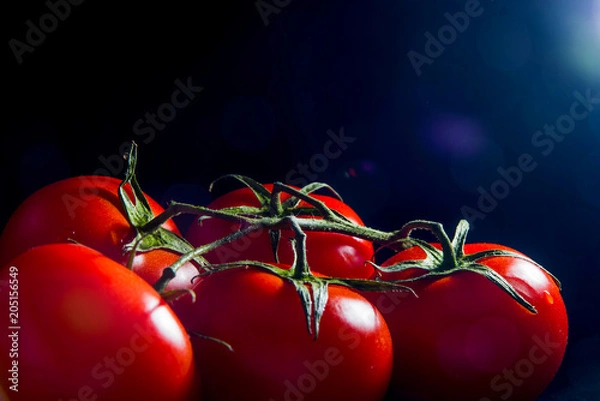 Obraz fresh red tomatoes close up black background