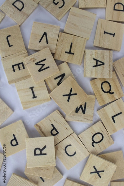 Obraz Wooden tiles with letters on an isolated white background