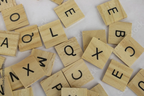 Obraz Wooden tiles with letters on an isolated white background