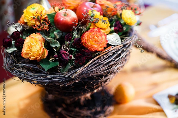 Fototapeta wedding bouquet, wicker nest with flowers