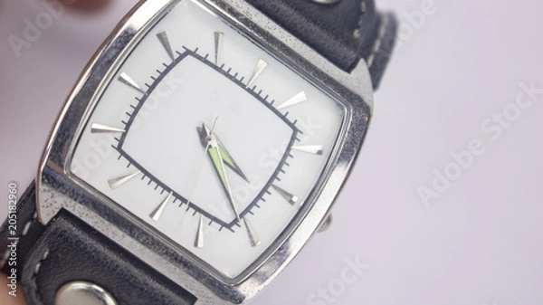 Obraz A man's wrist watch on an isolated white background 
