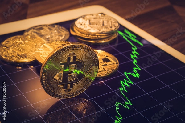 Obraz Bitcoin sign light reflect of price market graph.