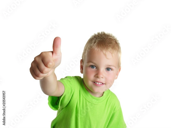 Fototapeta smiling boy shows ok gesture isolated on white background