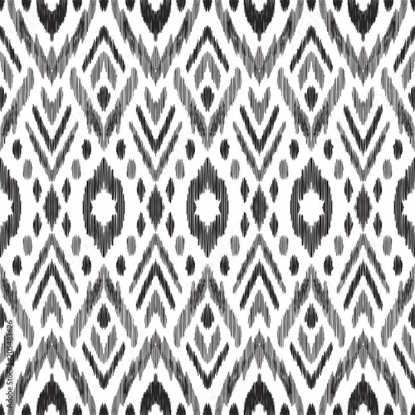 Obraz Tribal pattern. Seamless background. Scribble texture. Black and white graphic design. Creative vector illustration. Ethnic boho ornament. Impressive fashion print.