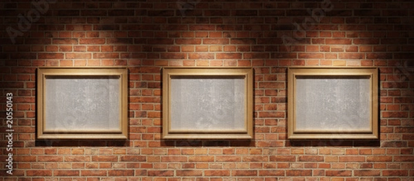 Obraz Three pictures on a brick wall