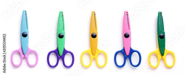 Fototapeta Five children's pinking shears in a row