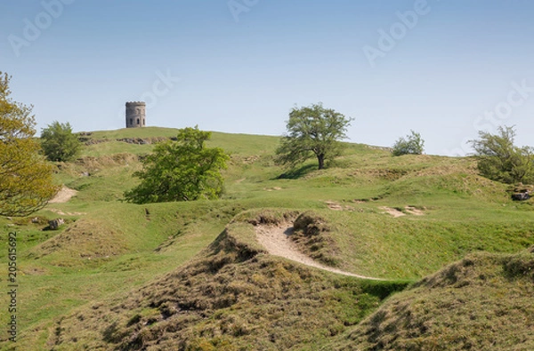 Fototapeta Rocky hills with Solomons Temple or Grinlow Tower in Buxton, Derbyshire Peak District