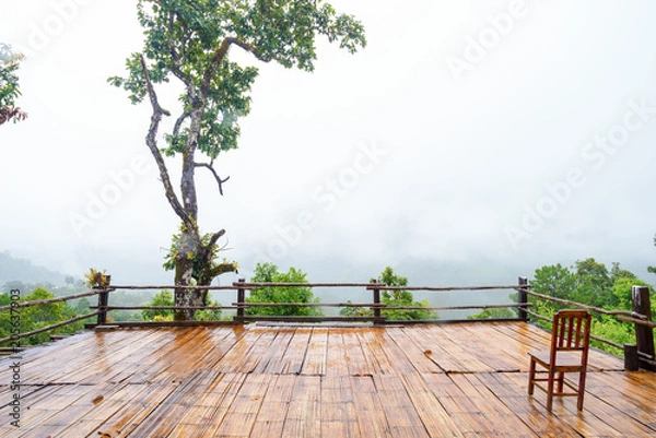 Fototapeta Patio and chair wood Mountain View in Asia, Doi Luang Chiang Dao Chiang Mai Thailand After rain, there is a fog float, covered with green forest, mountain air fresh air landscape nature concept