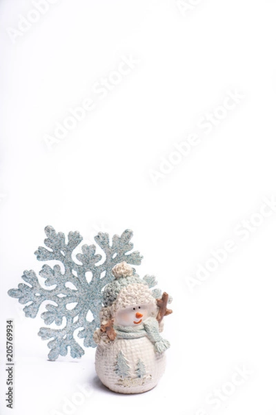 Fototapeta Decorative snowmen with snowflake copy space isolated white background, Christmas holidays postcard concept