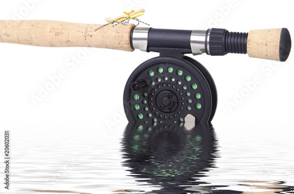 Obraz Fly rod and reel with fly isolated in the water