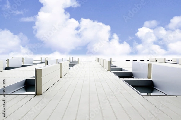 Fototapeta Abstract architecture with white facade against blue cloudy sky. From below, vanishing point and empty copy space for Editor's text.