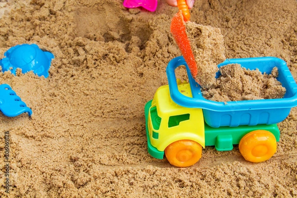 Obraz child playing in the sandbox