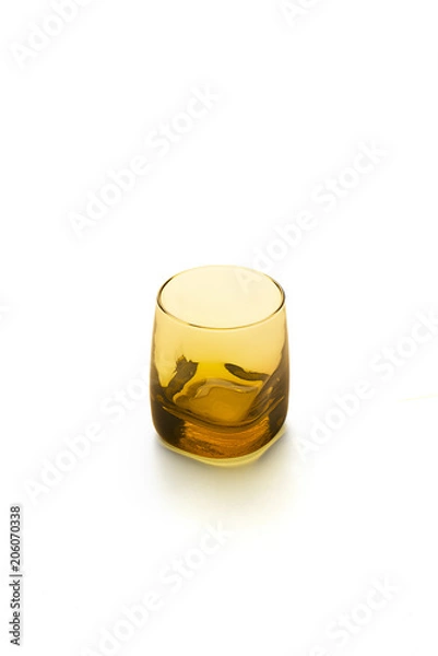 Obraz Bicchiere di vetro giallo