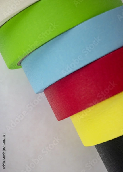 Obraz Bright colorful tape rolls in a pattern on an isolated white background with room for text and other objects! 