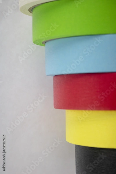Obraz Bright colorful tape rolls in a pattern on an isolated white background with room for text and other objects! 