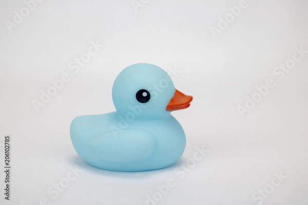 Obraz A blue rubber duck on an isolated white background 