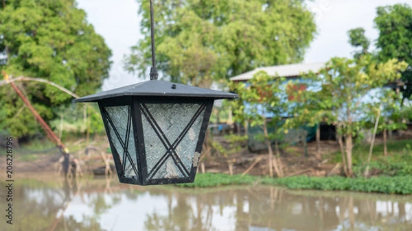 Obraz Close up lamp and river.